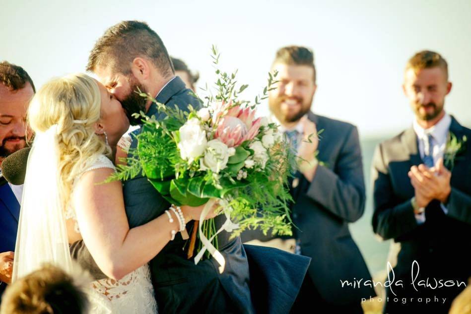 Newlyweds kiss