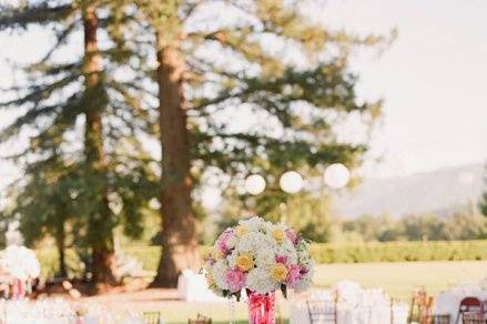 Table setting with tall floral centerpiece