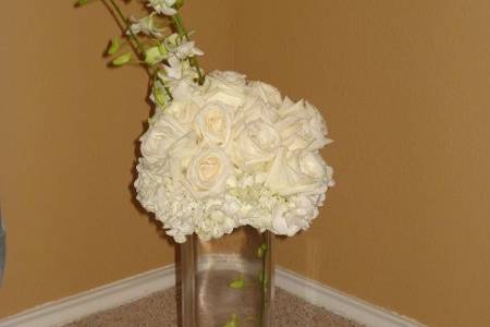 Tall centerpiece with floating orchid inside