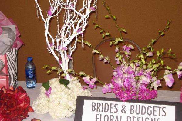 Manzanita tree and Orchid spray centerpieces