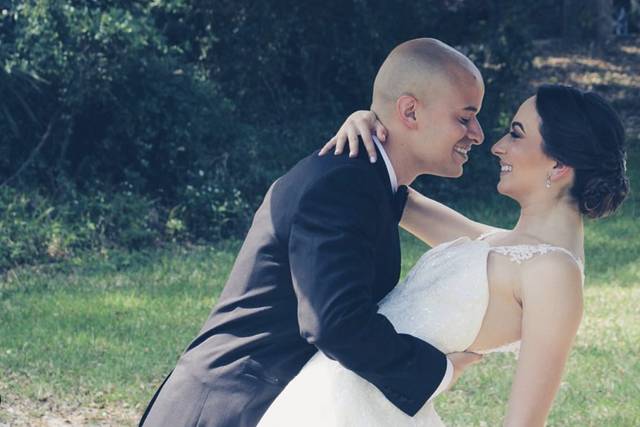 The couple smile at each other