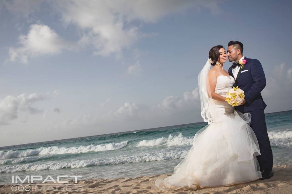 Newlyweds by the beach