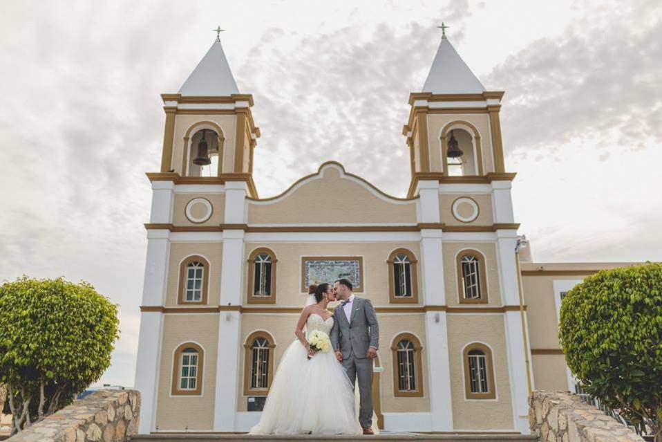 Newlyweds kissing