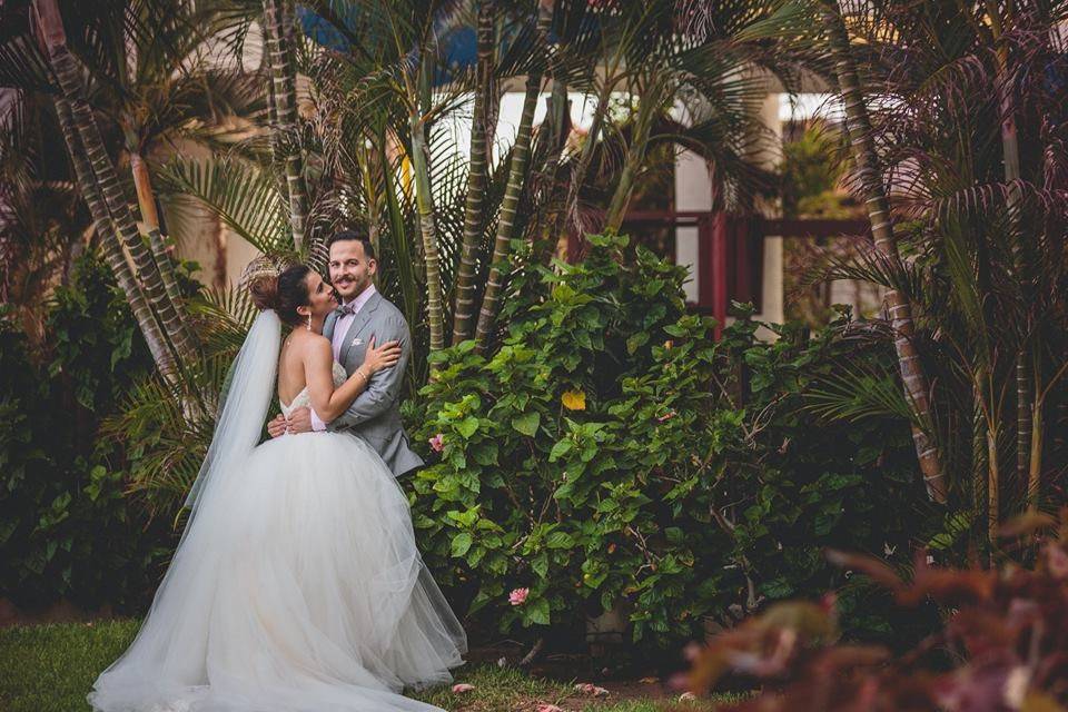 Bride and groom holding each other