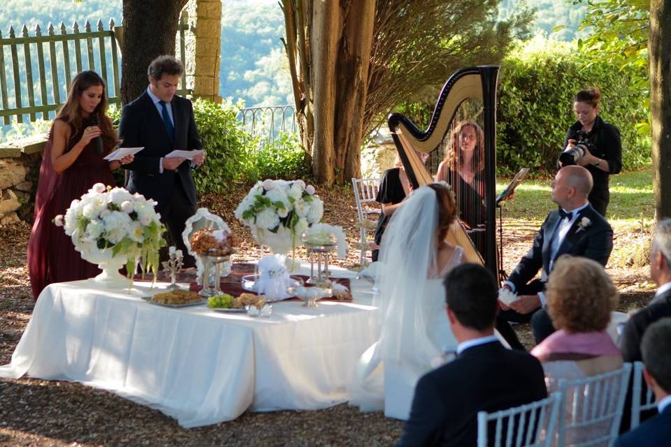 Harpist and female vocalist performing for an Italian/Lebanese wedding ceremony at Villa Vistarenni, Siena