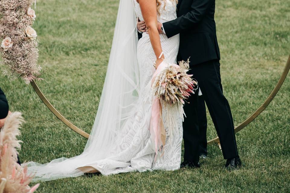 Couple in front of archway