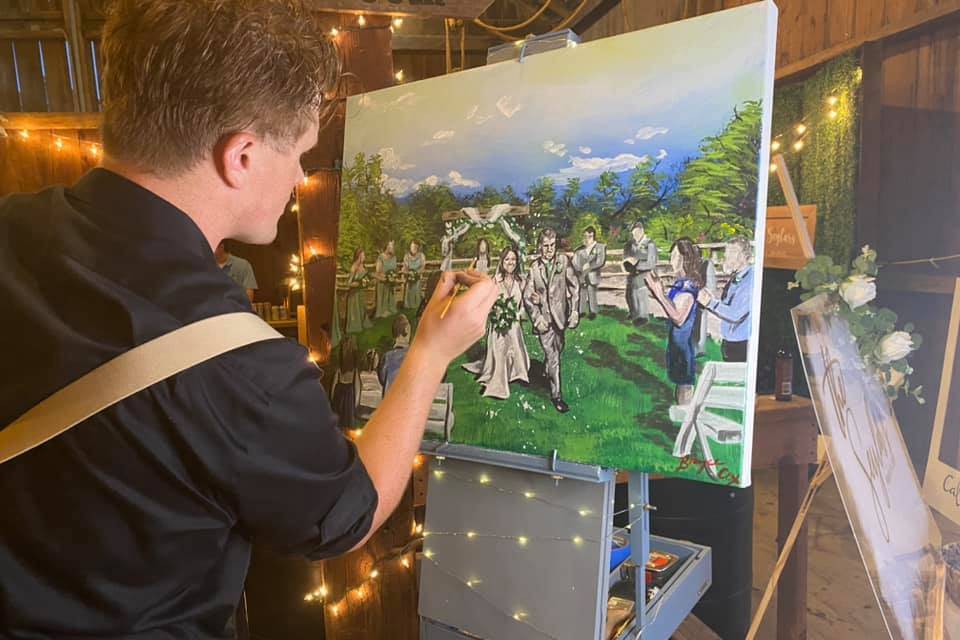 Artist paints a wedding scene