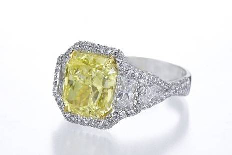 JB Star fancy yellow diamond and white diamond engagement ring.