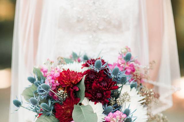 Bride holding a bouquet - Kelly Laramore Photography