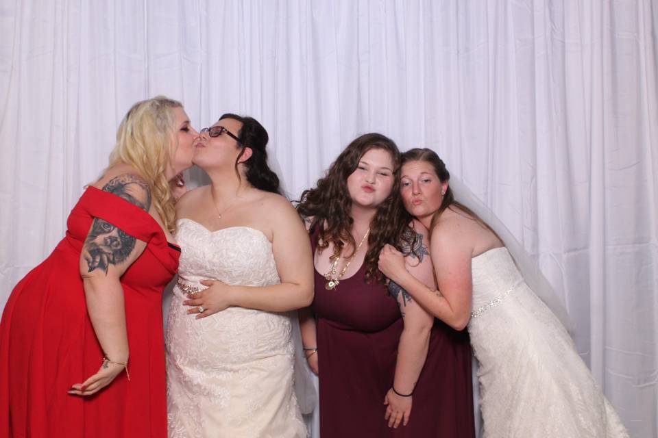 Kiss the brides