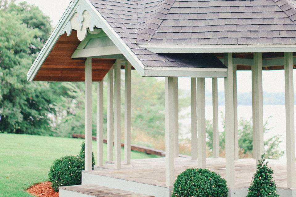 The gorgeous custom-built ceremony gazebo overlooks the lake, mountains, and a private beach!