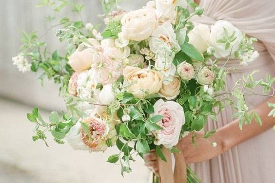 Member of the wedding party with bouquet