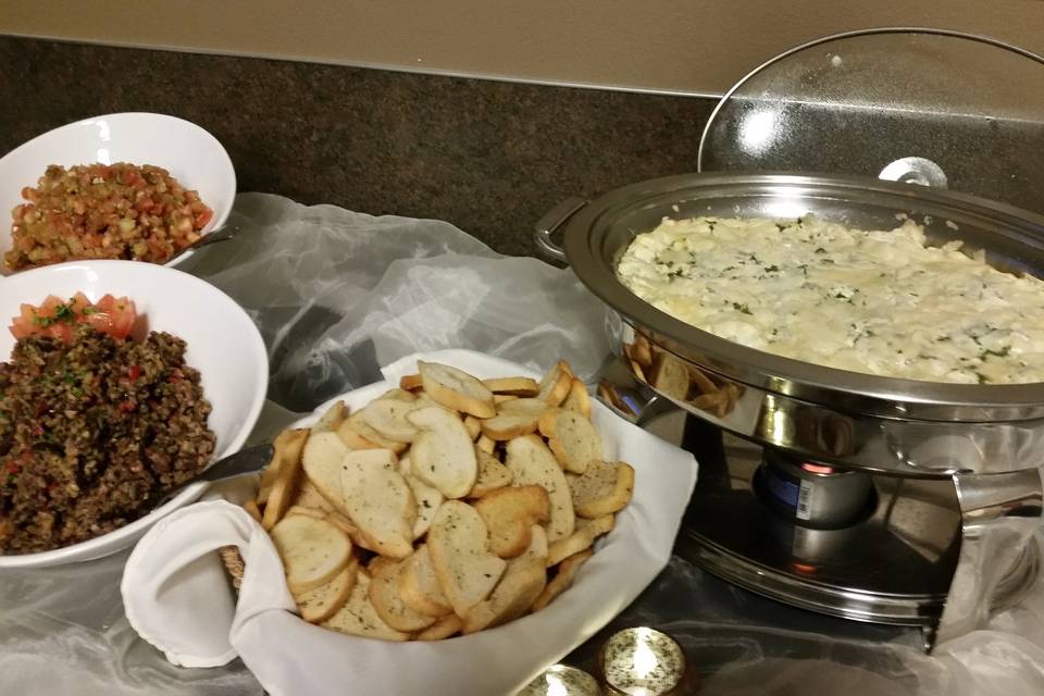 Hot artichoke dip with homemade crostini