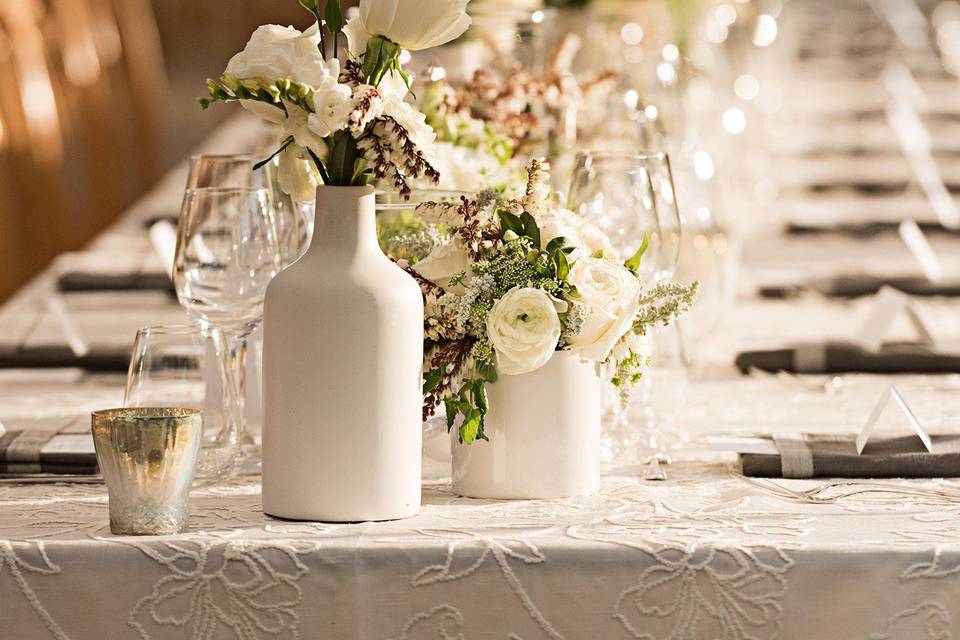 Reception table setting and floral centerpiece