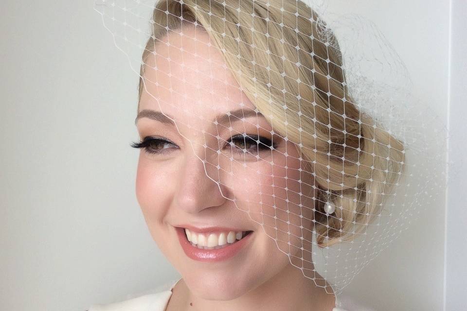 Bride in her netted veil