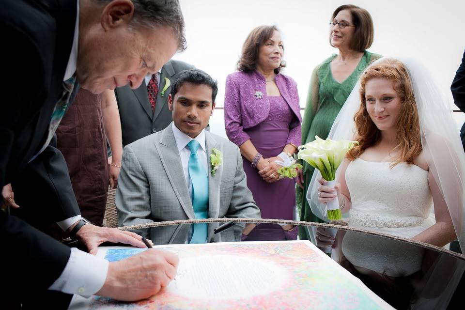 The Ketubah is usually signed by the couple, two witnesses, and me