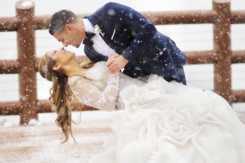 Groom dips his bride