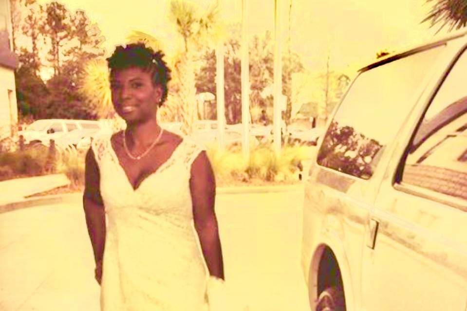 Bride by the car