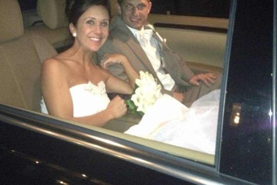 Newlyweds in their car