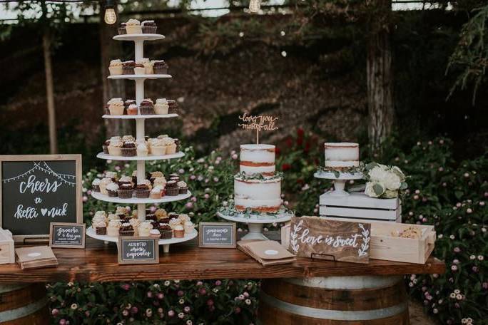 Wedding cake and cupcakes