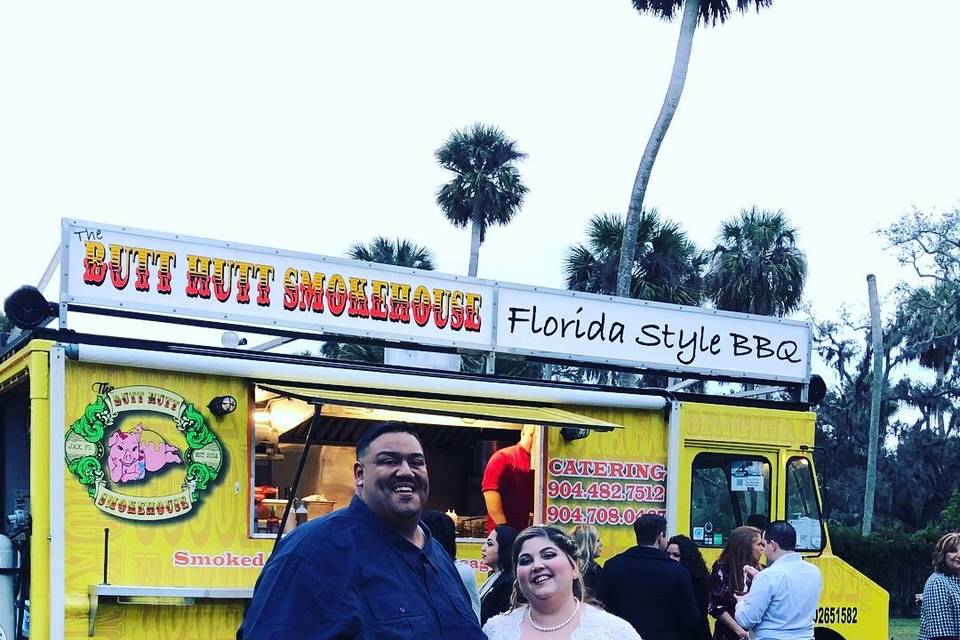 Newlyweds by the food truck