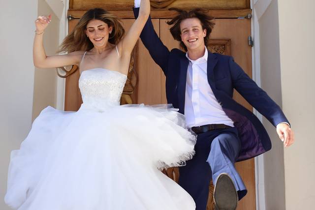 Newlyweds jump in the air