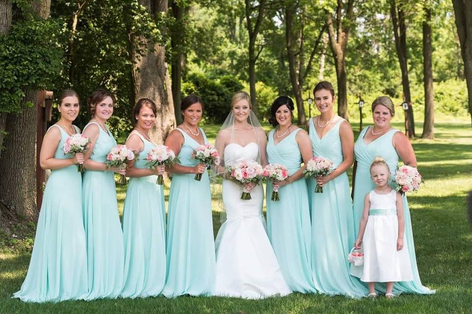 Bride, bridesmaid, and flower girl