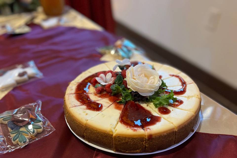 Cheesecake w/ Raspberry Sauce