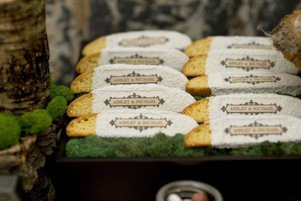 Custom designed biscotti on a dessert table- also great for favors and welcome baskets