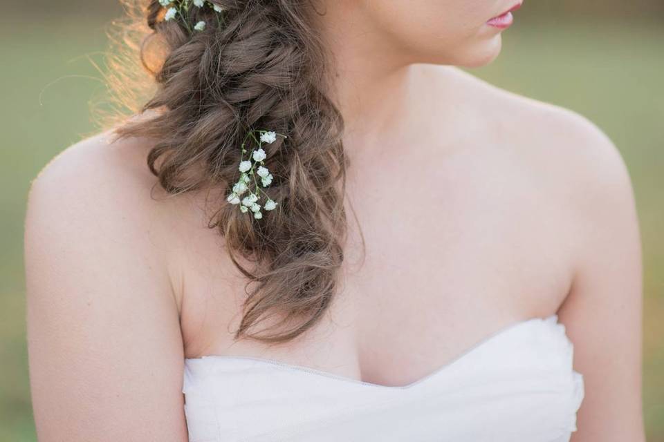 Braided side swept hair