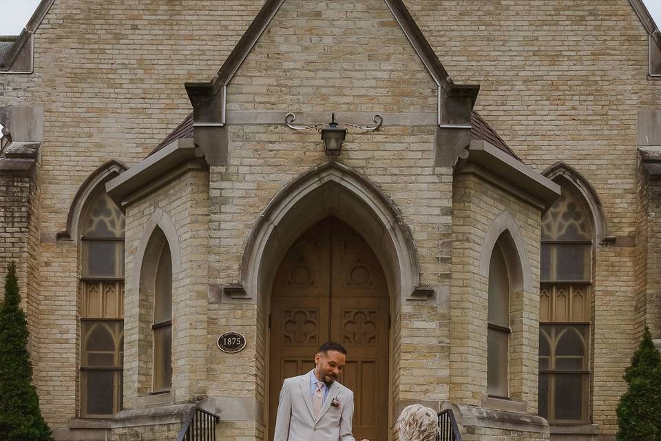 Married couple posed at church