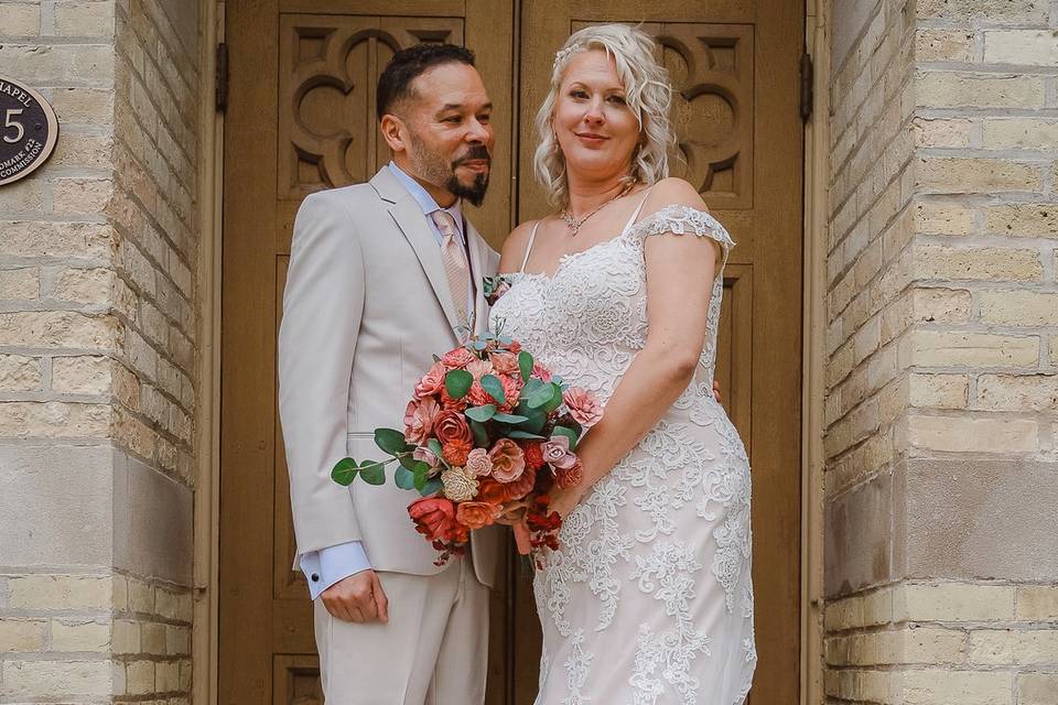 Married couple posed at church