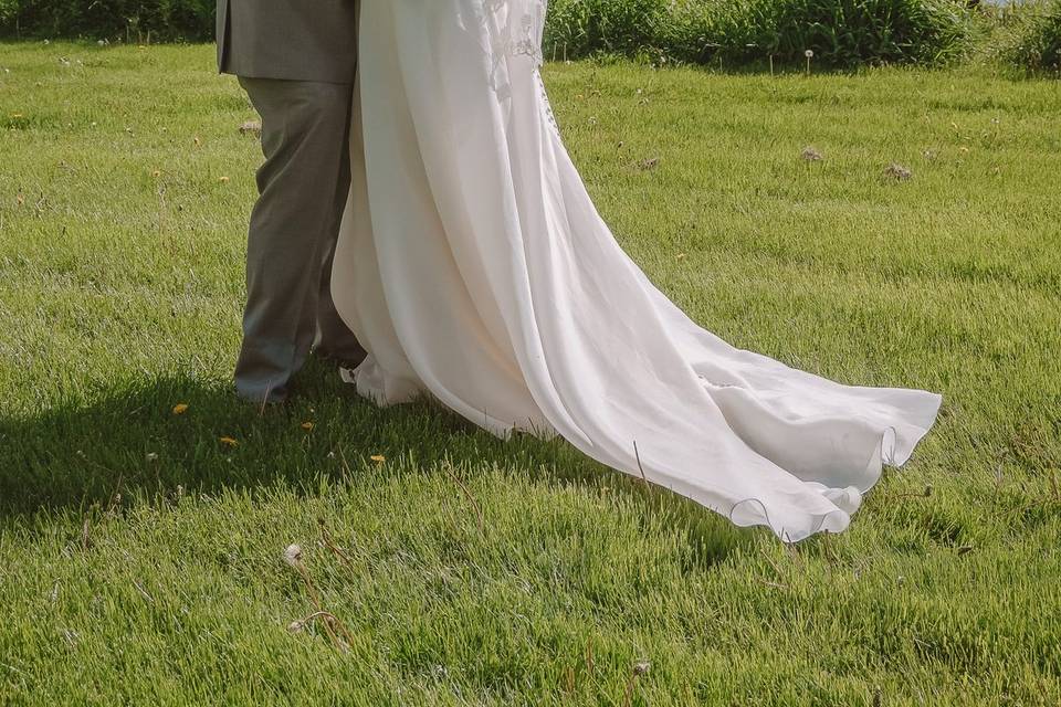 Bride and groom with lake