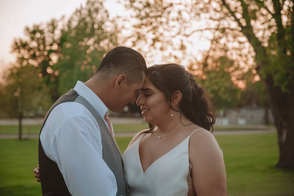 Bride and groom at sunset