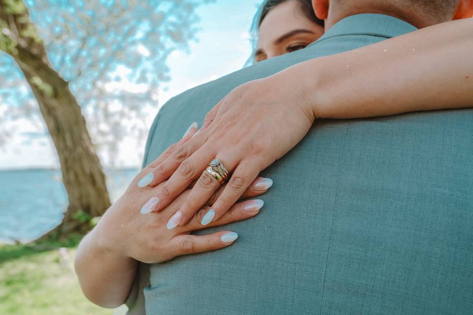 Bride and groom with lake pose