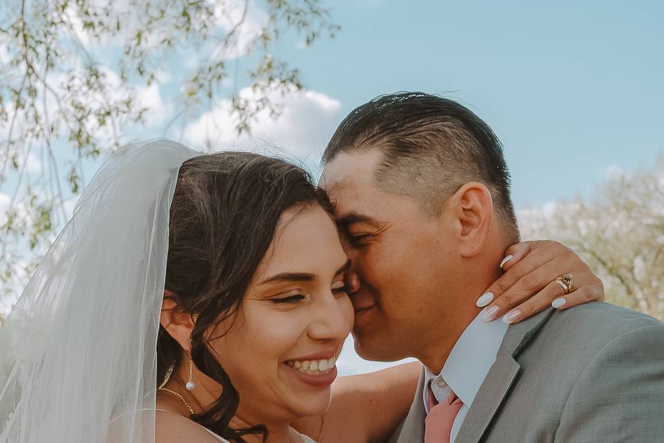 Bride and groom with lake pose