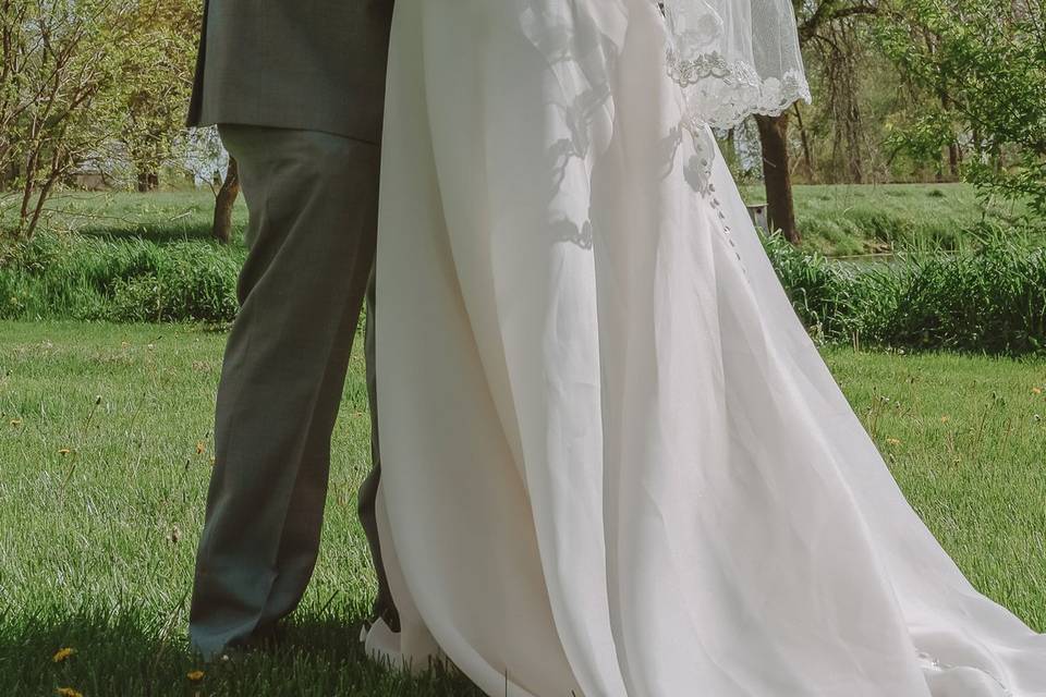 Bride and groom with lake pose