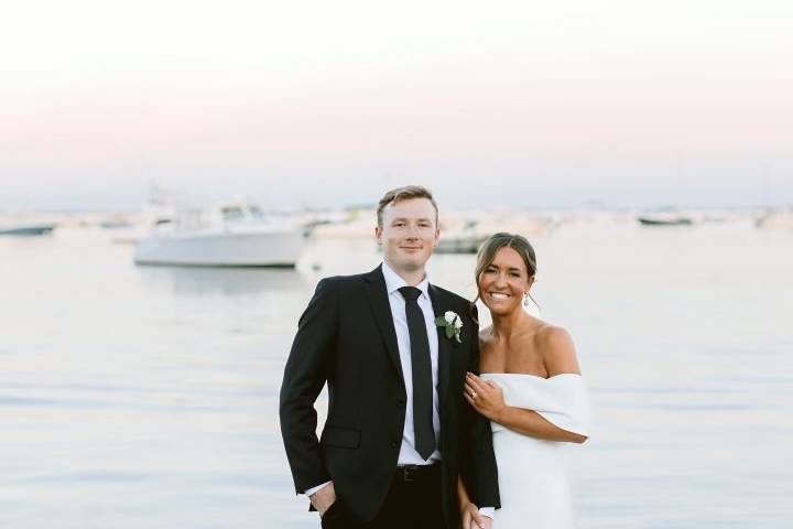 Windy waterfront couple