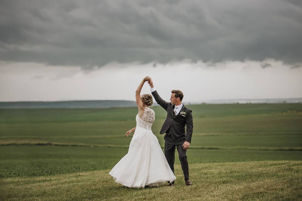 Bride and groom twirl