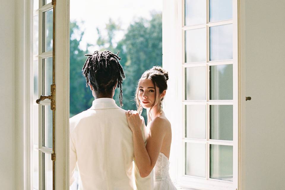 Couple looking out window