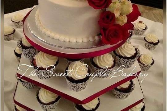 Cupcake tiers underneath wedding cake