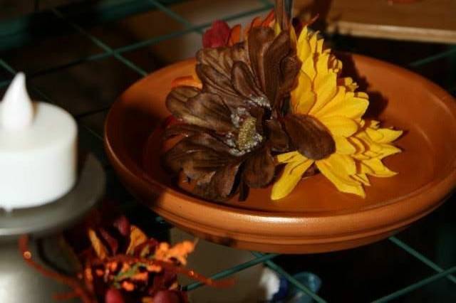 Fall themed centerpiece with artificial flowers