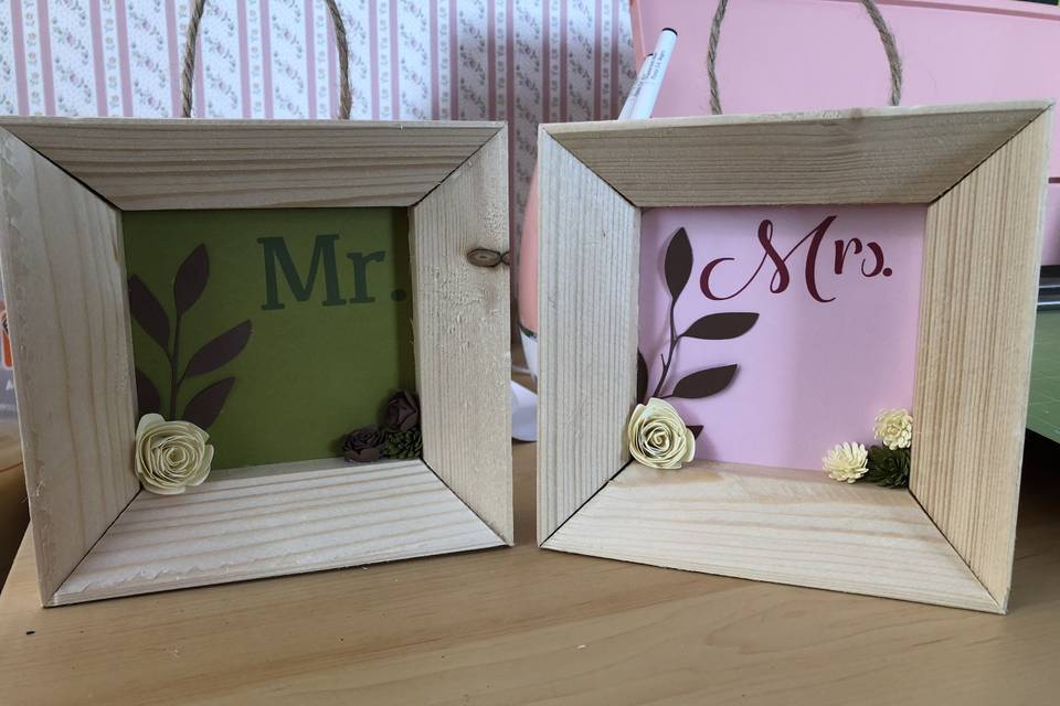 Wooden framed hanging signs