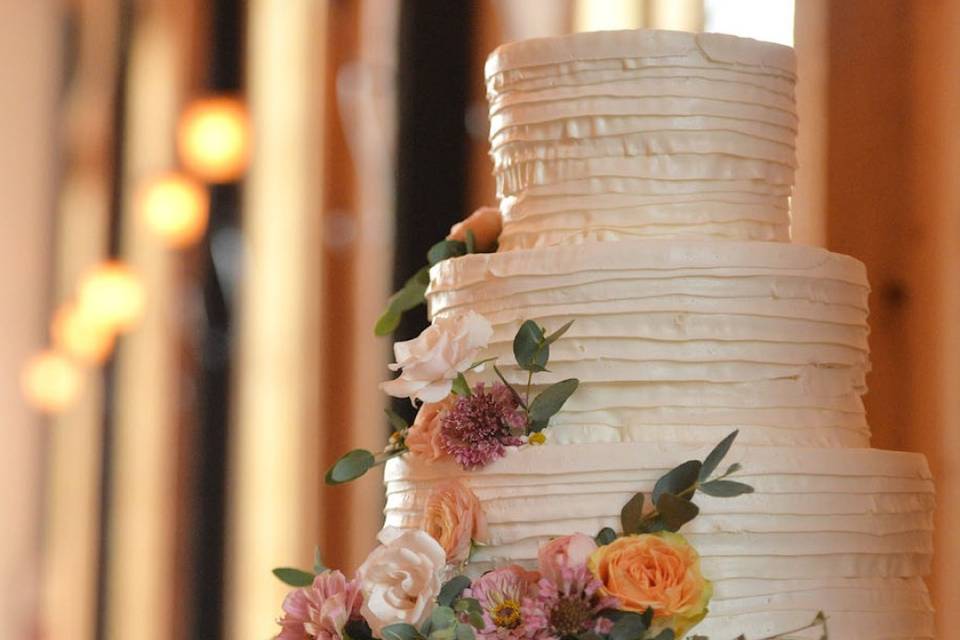 Two-sided wedding cake on swing