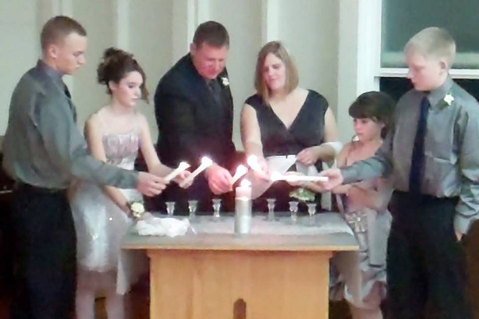 Dana and Tom incorporated a lovely Unity Candle Ceremony to symbolize the joining of their very special family!