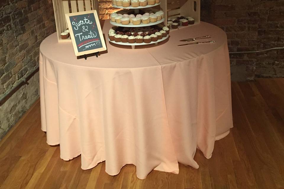 Cake and cupcakes table