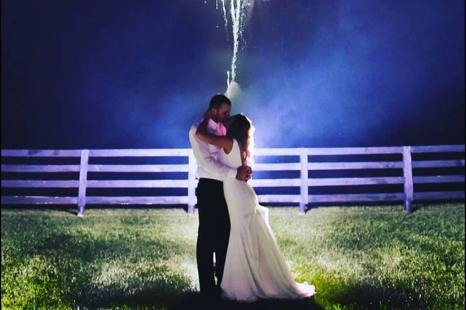 Romantic kissing under fireworks