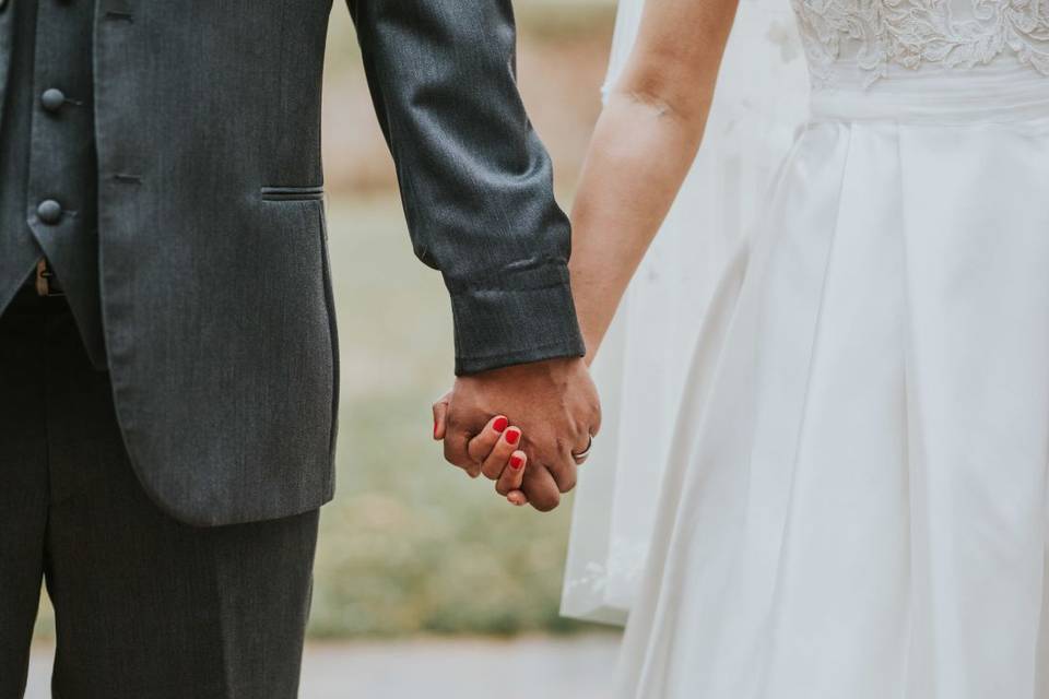 Couple holding hands