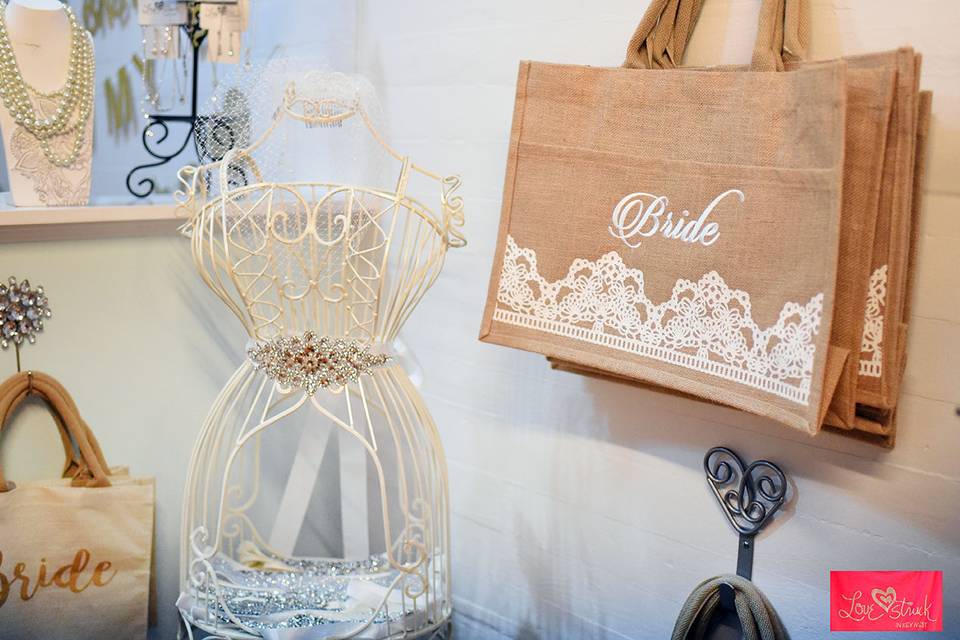 We have a great selection of bags for brides and the bridal party. Plus some beautiful sashes to accent your dress or your bridesmaids dresses