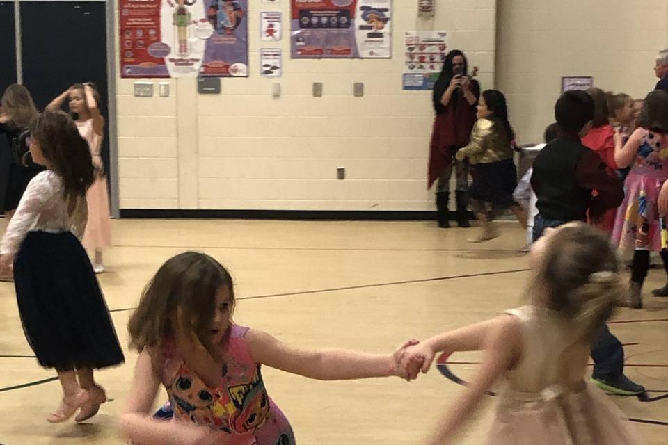 Girls dancing excitedly